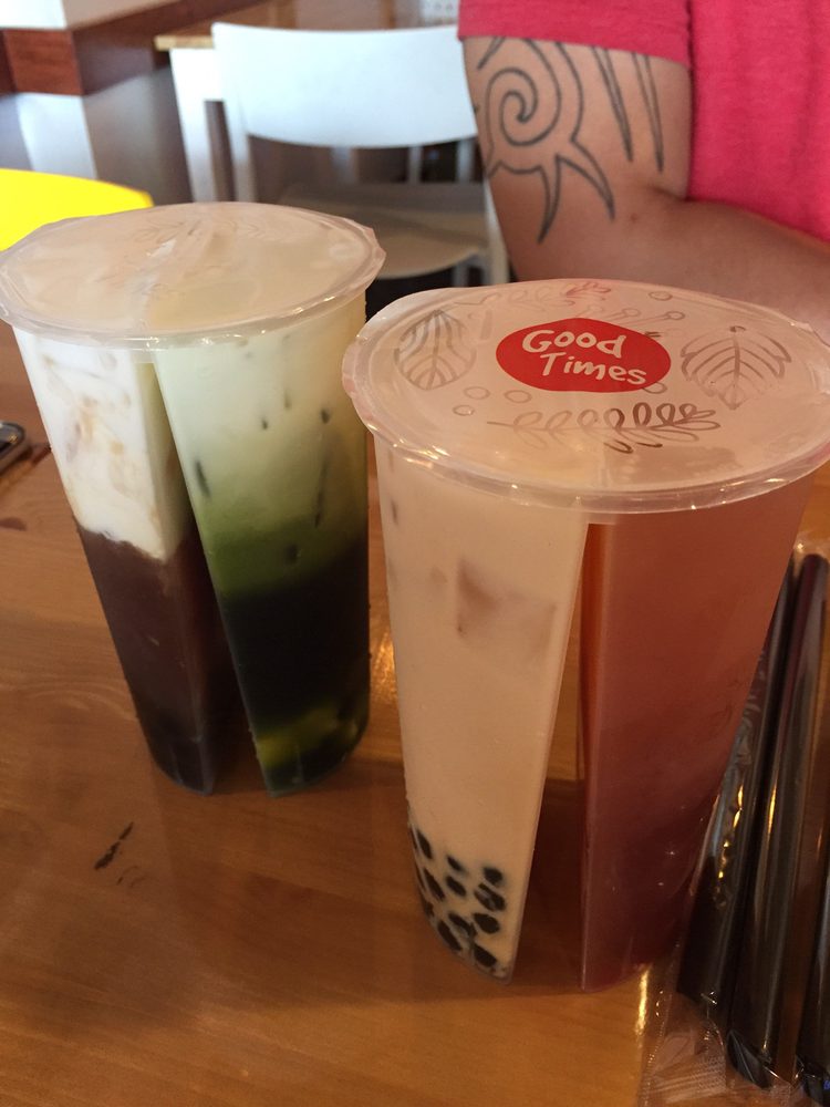 Split cups with Half winter melon and half Thai green milk tea then
