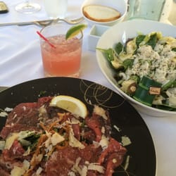 Sfixio - Beverly Hills, CA, United States. Beef carpaccio and crab salad.