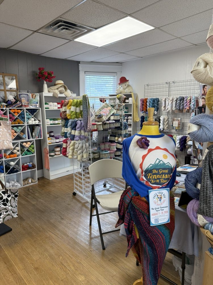 Sunshine Weaving & Fiber Arts Logo