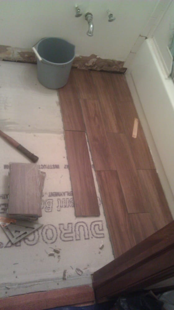 Snap On Tile Floor Just And Grout Yelp Photo Of Serrano Construction Chicago Il United States Snap On Tile Floor
