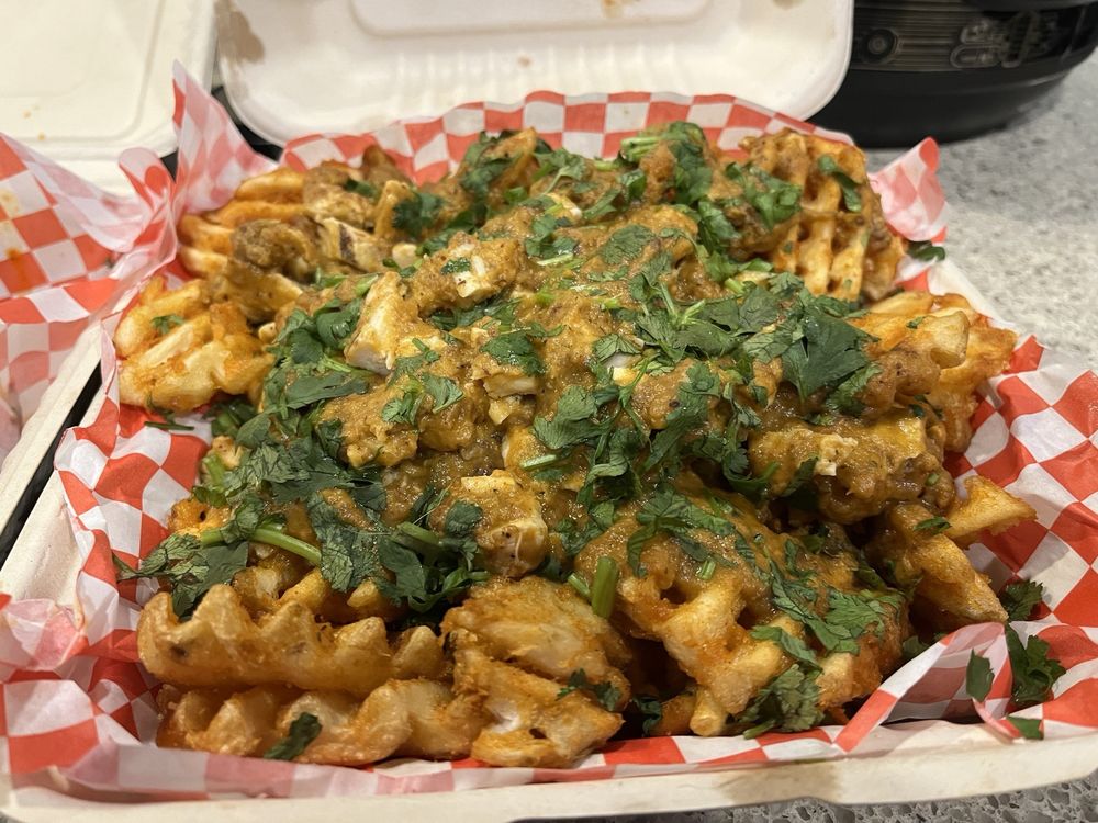 Mighty munch mountain curry pizza