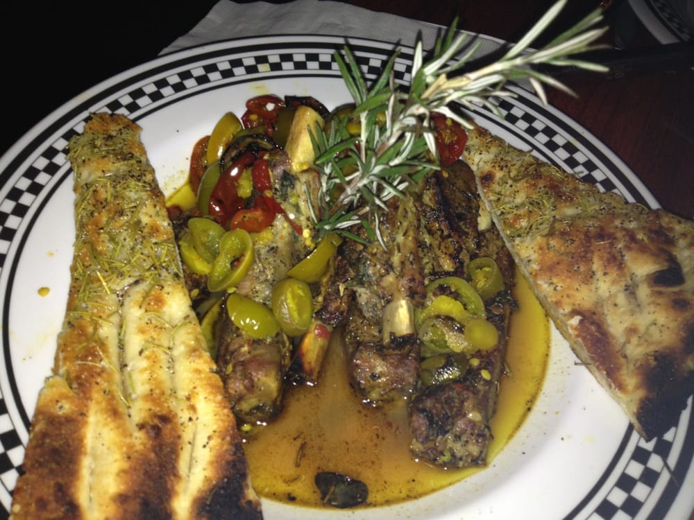 Ribs in a garlicky, hot peppers, rosemary & vinegar sauce Yelp