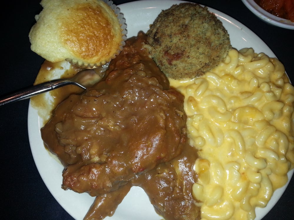 Smothered chicken, cornbread dressing, macaroni and cheese & a