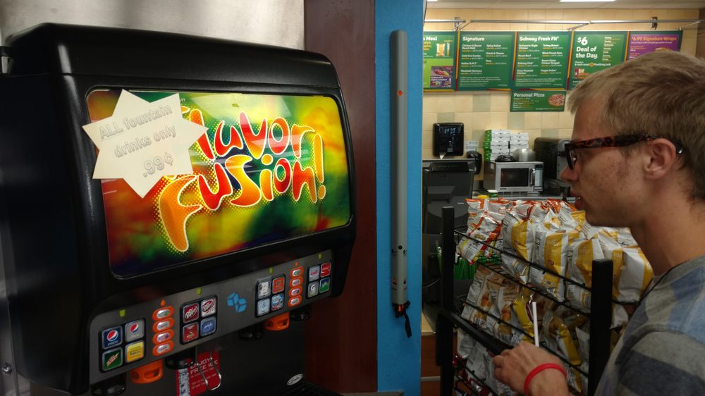 "ALL fountain drinks only .99 cents" declares a star