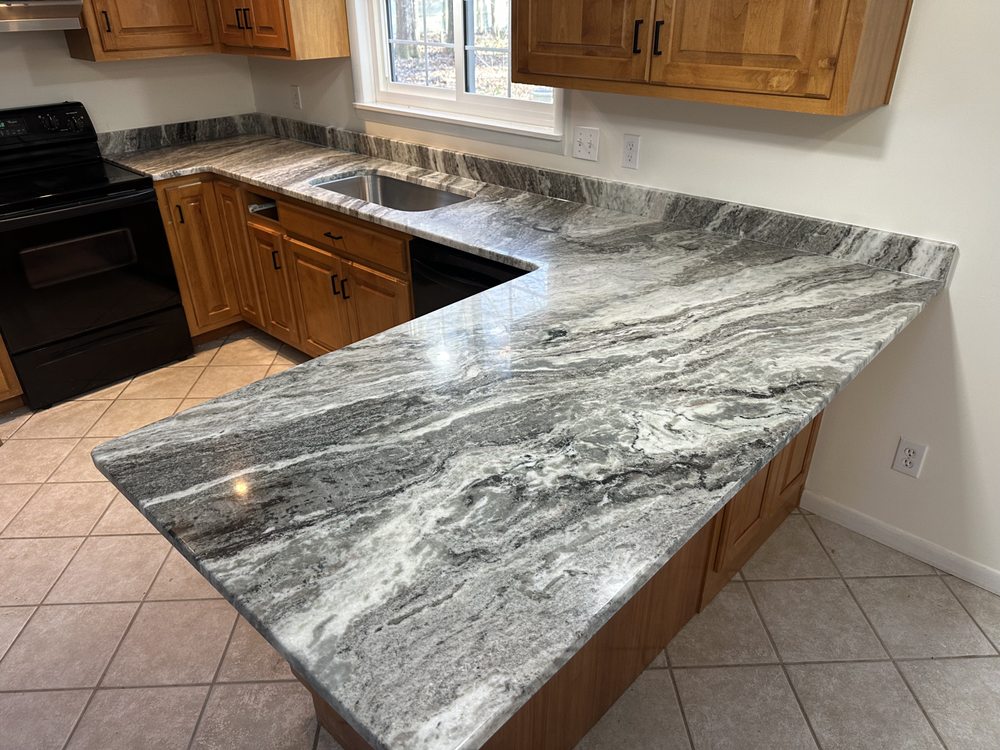 Ricardo’s Cabinets and Granite