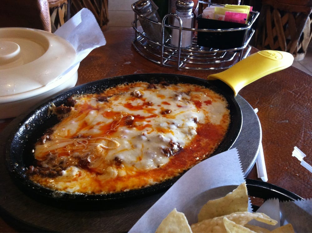 Queso flameado... It's smelled too good to wait to take the picture - Yelp