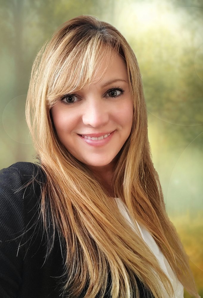 Anita C Carlson - Van Dorm Realty