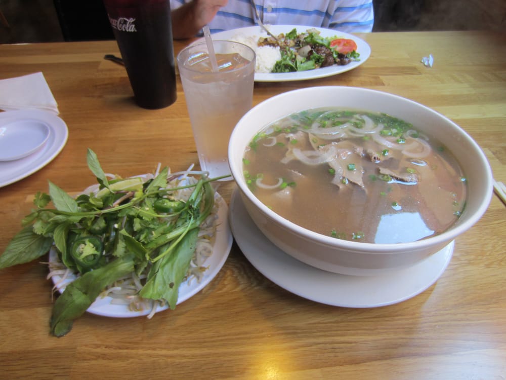 Extra large bowl of pho with sides. Yelp